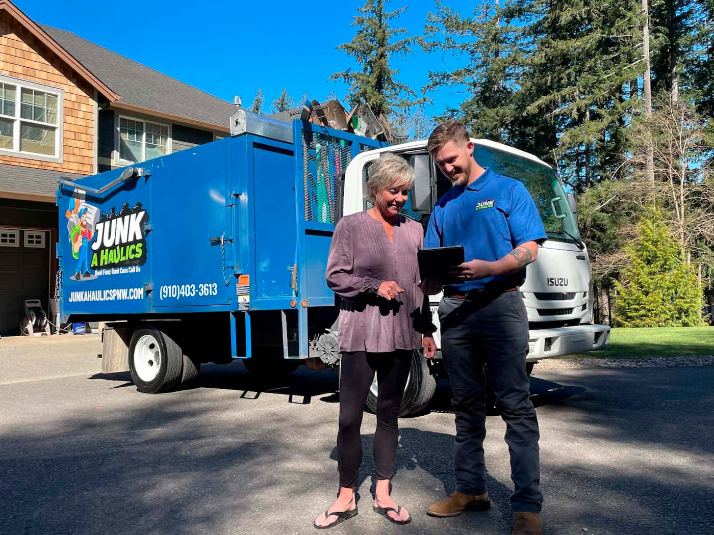 Truck blue sticker junk a haulics services customer in home